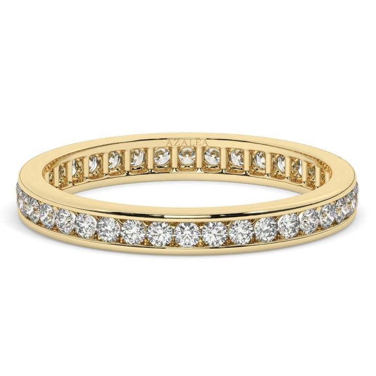 This eternity band features a classic channel setting that securely holds each sparkling gemstone in place, creating an uninterrupted circle of brilliance that represents the eternal nature of your love. Alternatively, choose from our options of sustainable lab-grown diamonds or dazzling moissanites at three different price points to fit your unique preferences and budget. Please check below to see specifications of each stone option. Each piece is accompanied by an Azalea Certification and Warranty card, ensuring that you receive a high-quality, authentic piece of fine jewelry. Please message us if you don't receive your certification with your piece. M A T E R I A L & L E N G T H Available in 14k Yellow Gold, 14k Rose Gold, 14k White Gold, 18k Yellow Gold, 18k Rose Gold and 18k White Gol Classic Round Cut Half Eternity Band, Yellow Gold Eternity Band With Channel Set, Classic Half Eternity Band For Anniversary, Yellow Gold Channel Set Eternity Band, Yellow Gold Diamond Eternity Band With Channel Setting, Classic Cubic Zirconia Eternity Band With Halo, Yellow Gold Channel Set Eternity Band For Wedding, Classic Eternity Band With Halo For Gift, Yellow Gold Cubic Zirconia Eternity Band Channel Set