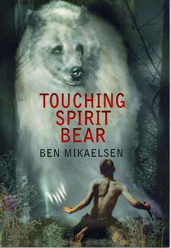 the cover of touching spirit bear by ben mikaelsen, with an image of a wolf