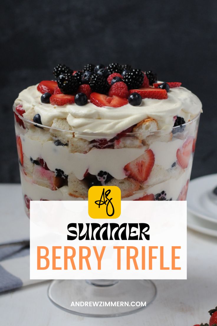 a close up of a dessert on a table with the words summer berry trifle