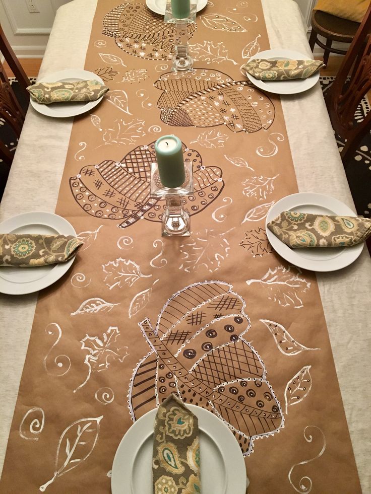 the table is set with plates and place settings