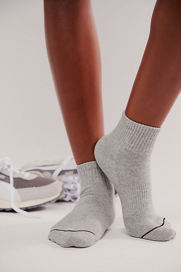 Forever cool and classic, these timeless crew socks are featured in a staple silhouette with ribbed top trim and varsity-inspired FP Movement buti logo for and added sporty touch. **Features:** Crew style, ribbed top hem, sporty embroidered logo, contrast toe and heel **Why We ❤ It:** Designed to take any fitness ‘fit up a notch, these go-with-anything socks are sure to be a staple in your athletic accessories collection. | Crest Buti Socks by FP Movement at Free People, Grey Winter Sporty Socks With Ribbed Cuffs, Sporty Winter Socks With Ribbed Cuffs, Casual Gray Sports Socks, Sporty Winter Socks For Streetwear, Sporty Stretch Socks For Streetwear, Casual Sports Socks For Spring, Sporty Spring Streetwear Socks, Sporty Stretch Ribbed Socks, Athletic Accessories