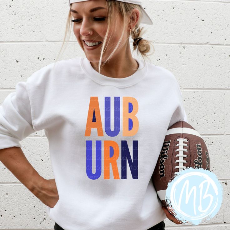 Get ready to show off your Auburn pride with this sweatshirt! With bold block letters and a game day ready design, this women's sweatshirt will elevate your school spirit. Perfect for football season or any day, this sweatshirt is a must-have for any Auburn fan! Tees run true to size. If you have any questions please feel free to ask. Fabric & Care:Machine wash warm or cold with mild detergentDry on normal dryer settingsDo not dry cleanDo not iron over design. If ironing is needed iron on low he Collegiate Team-colored Sweatshirt For Fall, College Team-colored Sweatshirt For Fall, Team-colored Fall Sweatshirt With Team Logo, Team-colored Sweatshirt With Team Logo For Fall, Collegiate Sweatshirt For Game Day In Fall, Collegiate Style Sweatshirt For Game Day In Fall, Fall Varsity Sweatshirt With Team Logo, Collegiate Sweats For College In Fall, Varsity Sweatshirt For Fall Sports Events