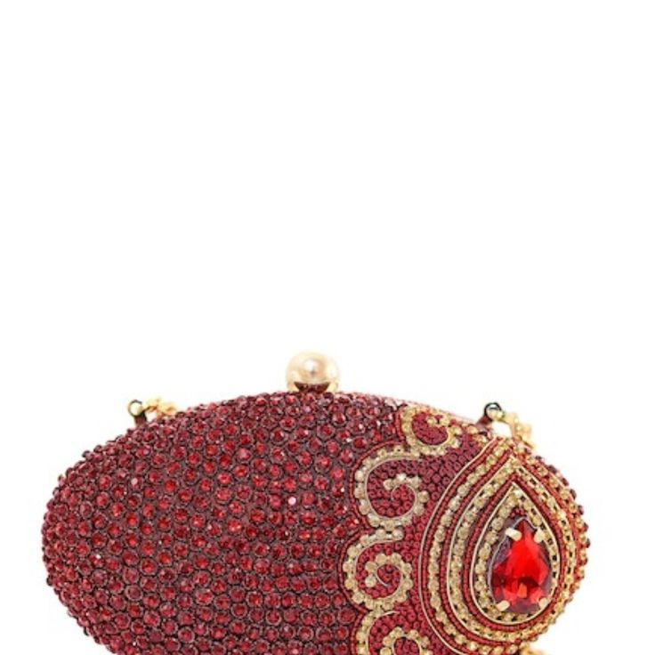 - Removable Multi-Strand Chain Shoulder Strap - Top Orb Clasp Closure - Exterior Features Tonal Elements And A Golden Paisley Pattern Side Splash With A Bold Red Jumbo Gem Embellishment - Interior Features Deep Red Lining And Slips Pocket - Approx. 7" H X 4" W X 3" D - Approx. 9.5" Strap Drop Materials Glass/Metal Exterior, Cotton Lining Care Please Note That This Bag Is Made With Antique/Vintage Fabrics And Its Charm Will Reveal Some Imperfections That Can Be The Red Embellished Evening Bag, Red Embellished Bag For Formal Occasions, Red Embellished Clutch For Formal Occasions, Glamorous Red Bag For Formal Occasions, Elegant Red Embellished Evening Bag, Formal Red Embellished Bag, Glamorous Red Formal Bag, Designer Red Clutch As Gift, Designer Red Clutch For Gift