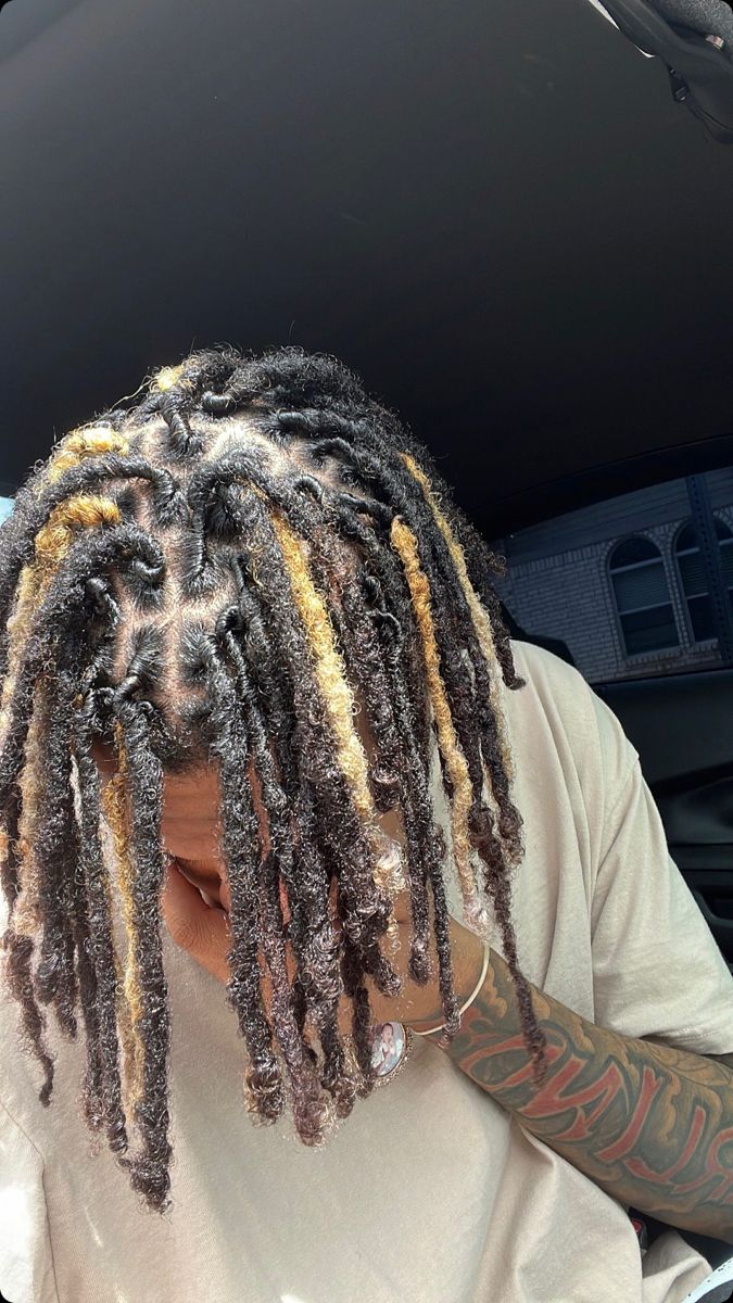 Dread Highlights Men, Dyed Locs Ideas Men, Color Dreads Black Man, Middle Part Dreads, Dreads Dyed Men, Dyed Dreads Men Tips, Men Dyed Locs, Blonde And Black Dreads, Honey Blonde Dreads Men