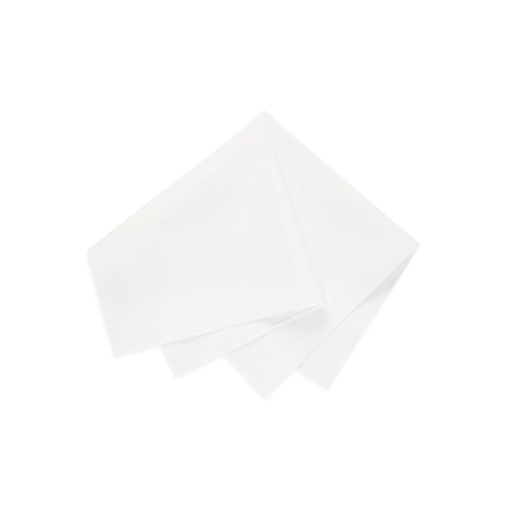 three white napkins on top of each other