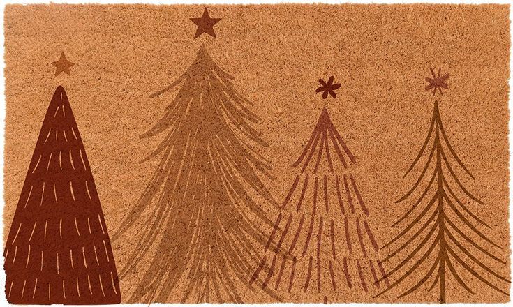 a door mat with three christmas trees on it