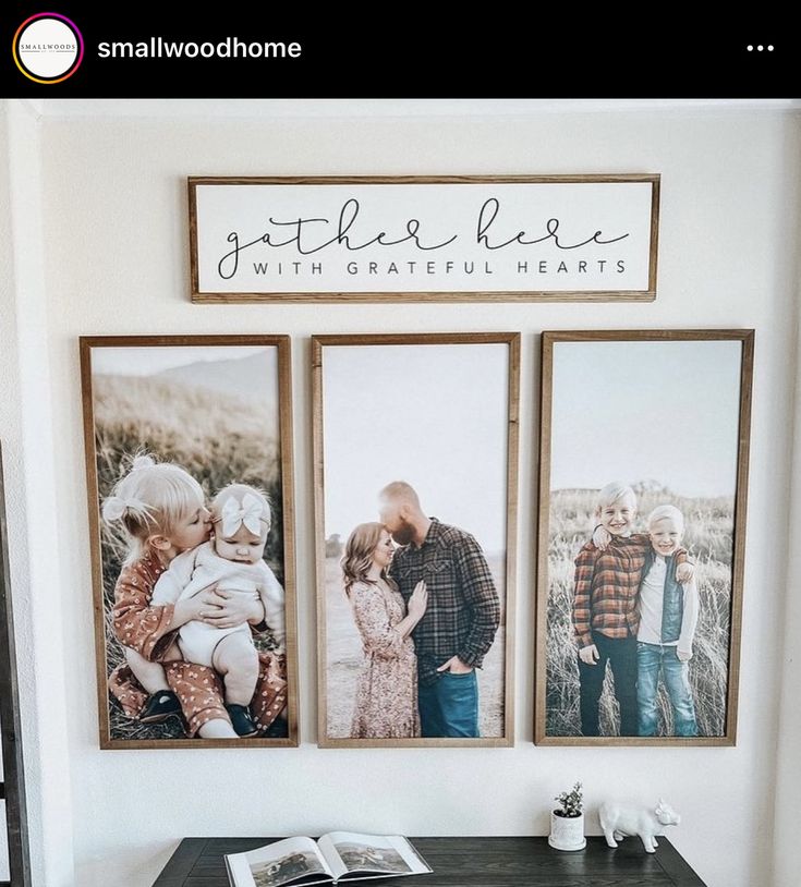 three framed photos hang on the wall above a desk