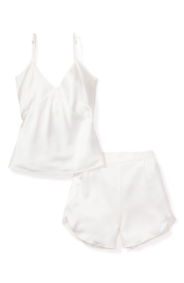 Drift off to dreamland in the luxury of whisper-light silk pajamas—this perfectly giftable set pairs a camisole with elastic-waist shorts. Camisole has V-neck; adjustable straps Shorts have elastic waist 100% silk Hand wash, dry flat Imported White Satin Pajama Set, White Satin Pajamas, Sleepy Outfits, Traveling Wardrobe, White Pjs, Elegant Pajamas, Money Couple, White Short Set, Silk Pj Set