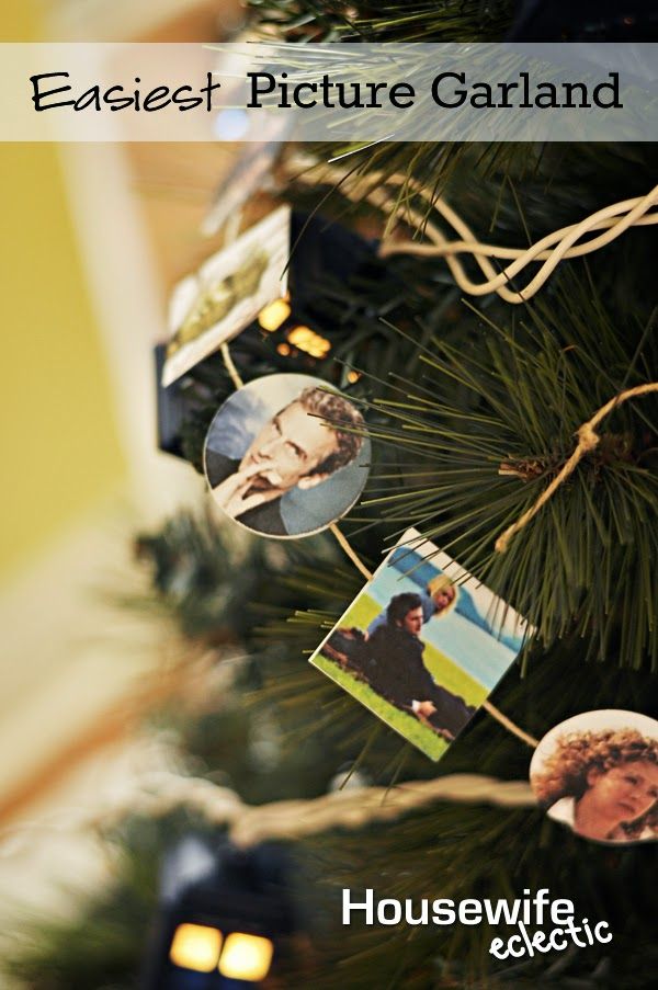 a christmas tree with pictures hanging from it's branches and the words, easter picture garland