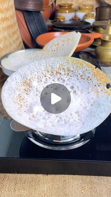 a glass table topped with a bowl filled with food