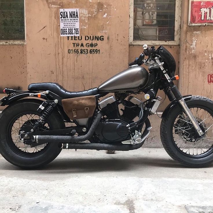 a motorcycle parked in front of a building