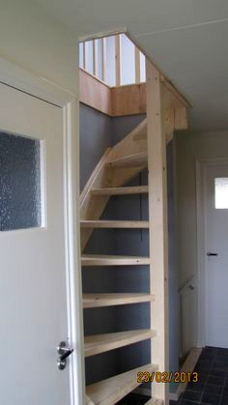 a stair case in the corner of a room