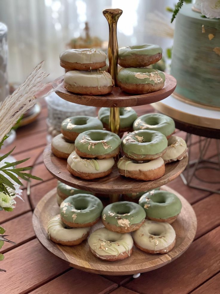 three tiered tray with donuts on it