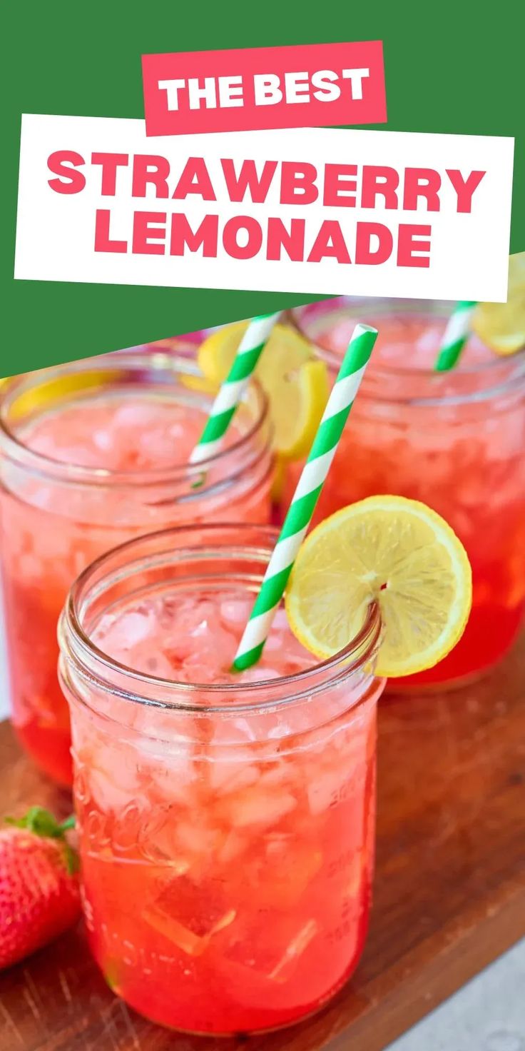 strawberry lemonade in mason jars with strawberries and limes on the side for garnish