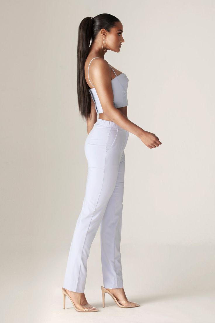 Our 'Carla' crop structure top is beautifully crafted from a crepe fabric in a off white tone to welcome in the warmer season. Inspired by traditional crop top, The boning provides corset-inspired structure and support that snatches the figure and we love the ruching across the bust to enhance the feminine feel in a 90's inspired straight neckline held by delicate spaghetti straps.We think the cropped length works well with a 'Niaz' high waisted wide legs pants.It has adjustable hooks and eyes t Traditional Crop Top, Wide Legs Pants, Baby Crop Top, White Tone, Straight Neckline, 90s Inspired, Modern Dress, Wide Legs, Crepe Fabric