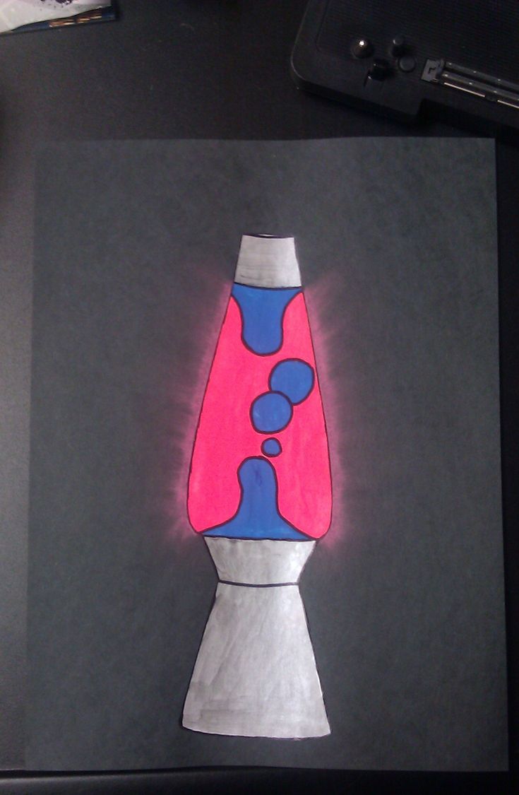 a drawing of a pink and blue vase on a black paper with a pen next to it