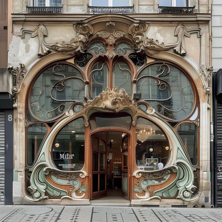 an ornate entrance to a building on a city street