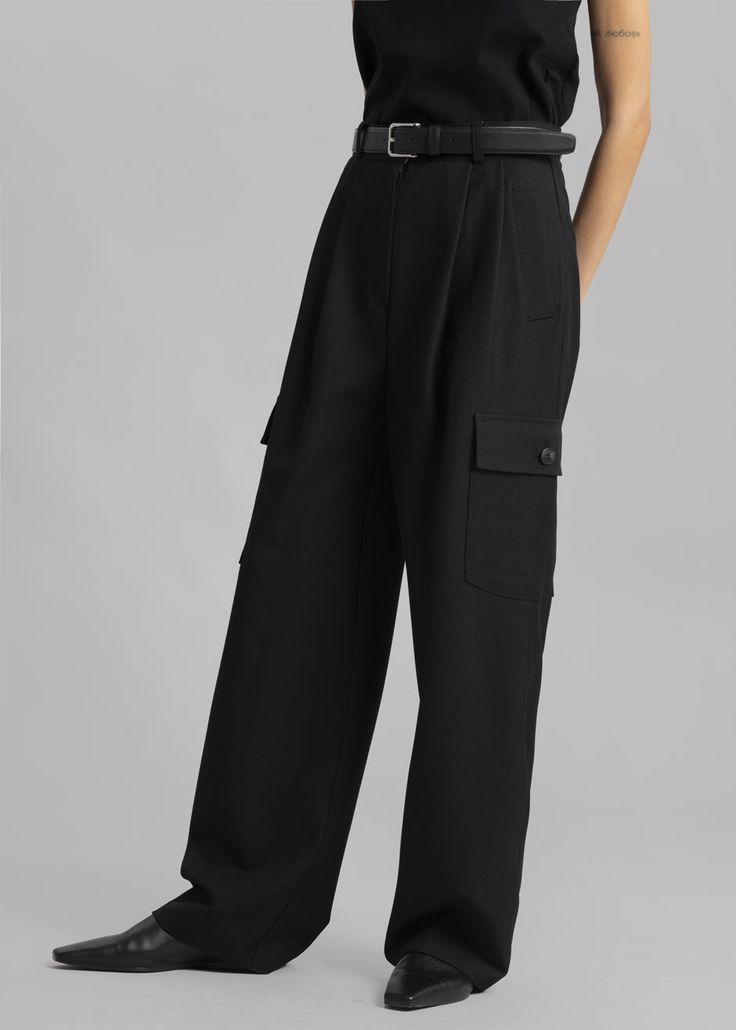 Color: Black Traditional suiting fabric with light stretch Tailored cargo style Pleat front detail Welt hip pockets Enlarged cargo pockets at the leg Unlined 77% Polyester 18% Rayon 5% Spandex Dry Clean By The Frankie Shop. Imported Product Measurements: XS - 24" Waist, 38" Hip, 13" Rise, 29" Inseam S - 26" Waist, 40" Hip, 13.5" Rise, 29.5" Inseam M - 28" Waist, 42" Hip, 14" Rise, 30" Inseam L - 30" Waist, 44" Hip, 14.5" Rise, 30.5" Inseam Model is 174cm/ 5'8" wearing size M Shop Cargo Pants, Corporate Goth, The Frankie Shop, Suiting Fabric, Business Pants, Frankie Shop, Fashion Aesthetics, Cargo Style, Clothes Shop