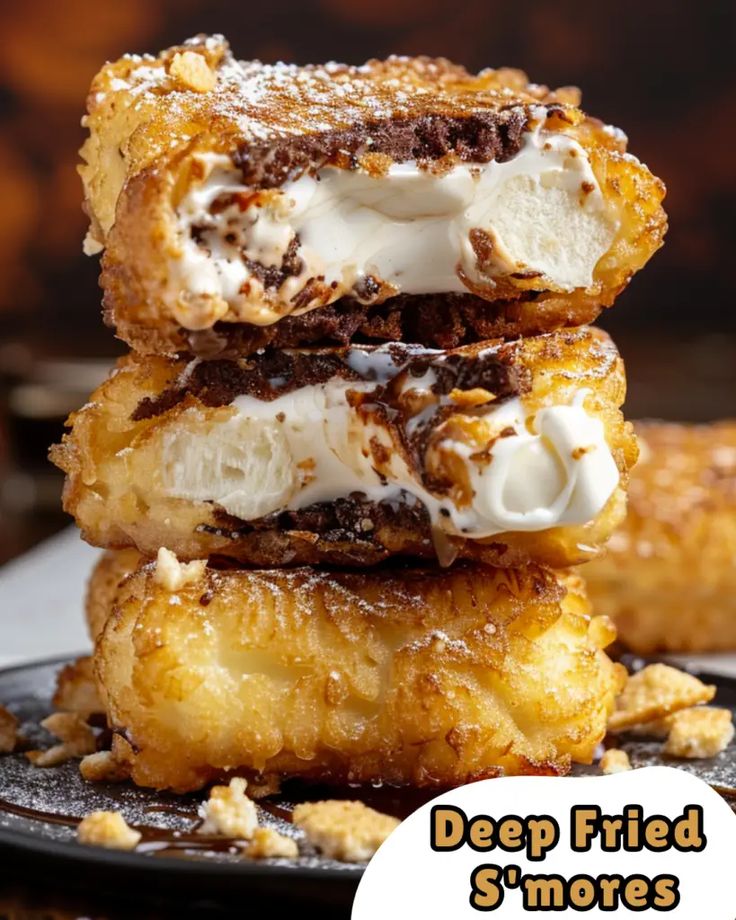 three desserts stacked on top of each other with the words deep fried s'mores