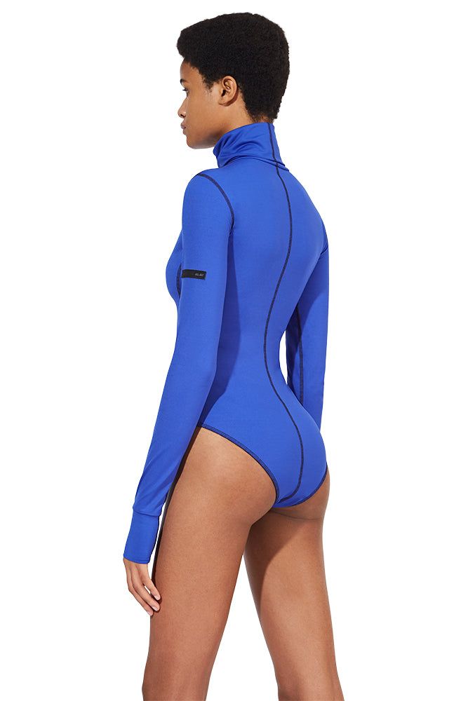 THE GERENUK BODYSUIT - STYLISH STRETCH TURTLENECK WINTER BASE LAYER Fall Nylon Stretch Bodysuit, Trendy Solid Color Nylon Bodysuit, Fall Second-skin Bodysuit With Thumbholes, Trendy Second-skin Long Sleeve Bodysuit, Winter Stretch Elastane Bodysuit, Long Sleeve Bodysuit With Thumbholes, Blue High Stretch Elastane Bodysuit, High Stretch Blue Elastane Bodysuit, Long Sleeve Unitard With Thumbholes