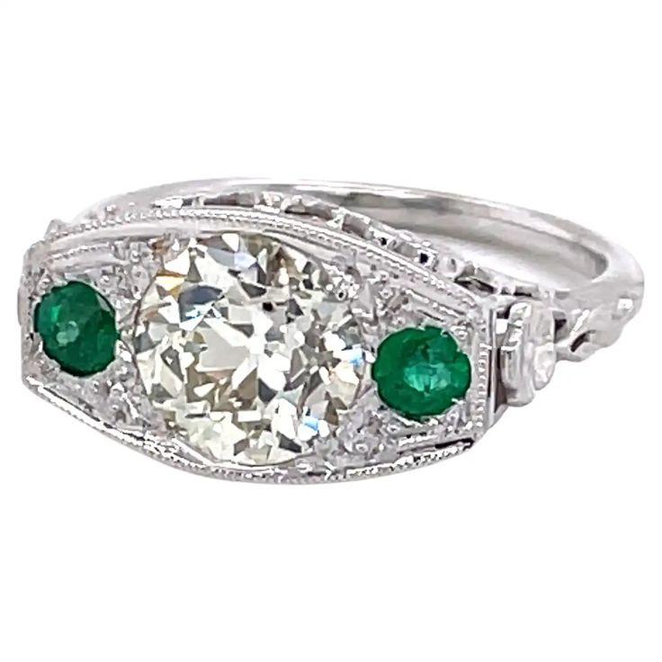 Antique Edwardian Diamond Emerald 18 Karat White Gold Filigree Ring For Sale at 1stDibs 1920s Engagement Ring Vintage, 1920s Engagement Ring, Filigree Ring Gold, Edwardian Engagement Ring, Antique Style Rings, Edwardian Ring, Antique Engagement Rings Vintage, Contemporary Engagement Rings, Edwardian Jewelry