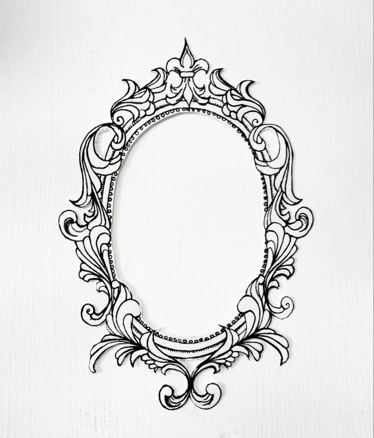 a black and white photo frame with an ornate design