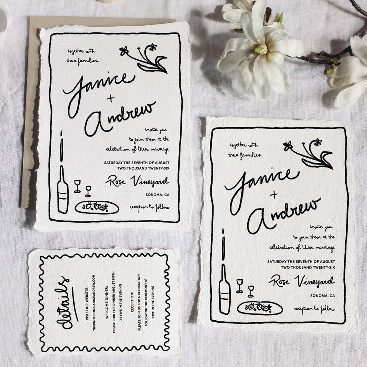 the wedding stationery is laid out next to each other