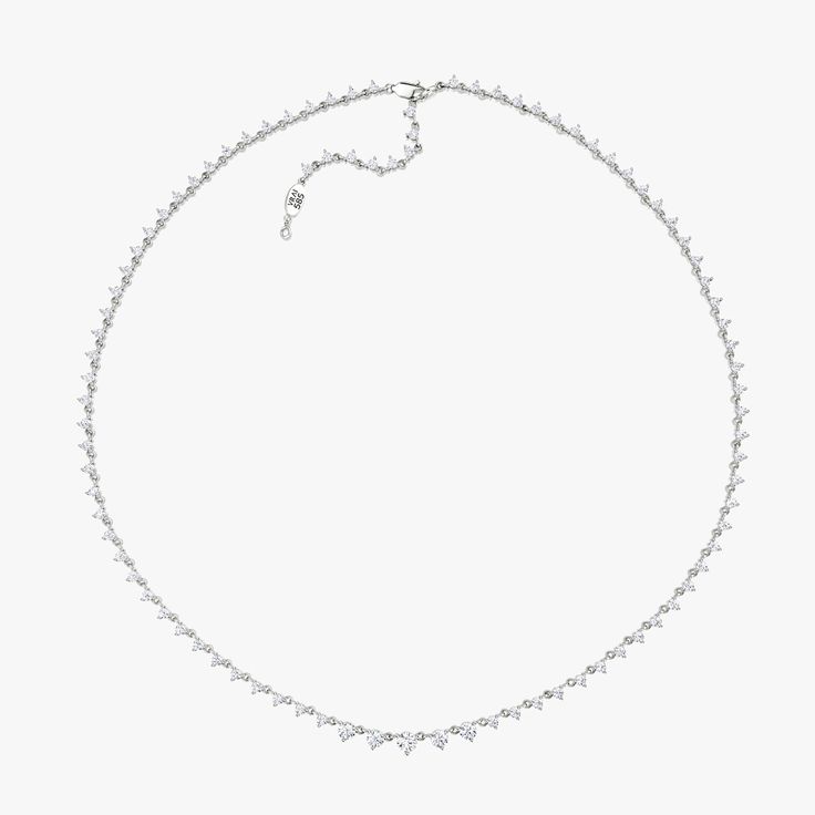 An endless array of graduated Round Brilliant VRAI created diamonds are linked together in a minimal setting that is both modern and romantic. Silver Minimalist Diamond Tennis Necklace, Minimalist Silver Diamond Tennis Necklace, Elegant Sterling Silver Tennis Necklace With Single Cut Diamonds, Silver Minimalist Tennis Necklace For Anniversary, Minimalist Silver Tennis Necklace For Anniversary, Elegant Infinity Necklace In Diamond White, Elegant Infinity Diamond Cut Jewelry, Minimalist Diamond Cut Tennis Necklace For Anniversary, Minimalist Tennis Necklace With Brilliant Cut For Anniversary