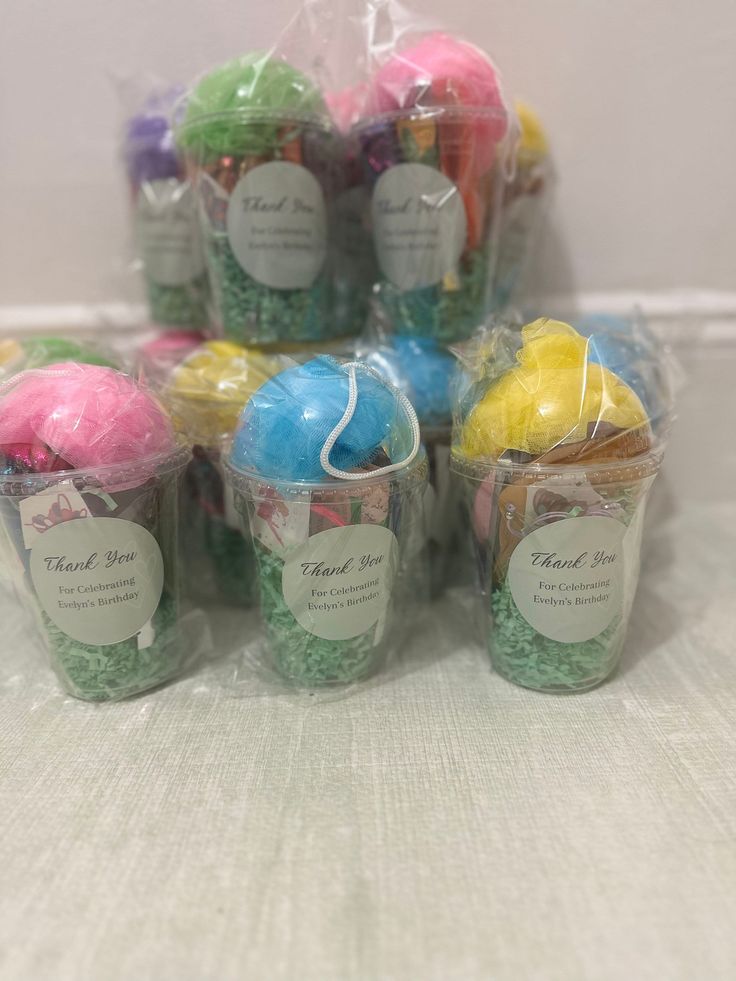 plastic bags filled with different colored balls of yarn