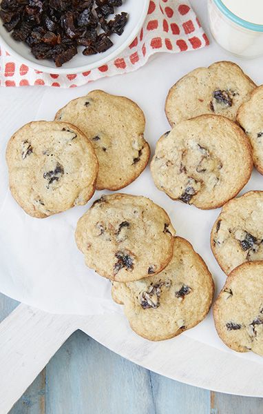 chocolate chip cookies and raisins on a table