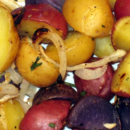 potatoes, onions and other vegetables on a plate