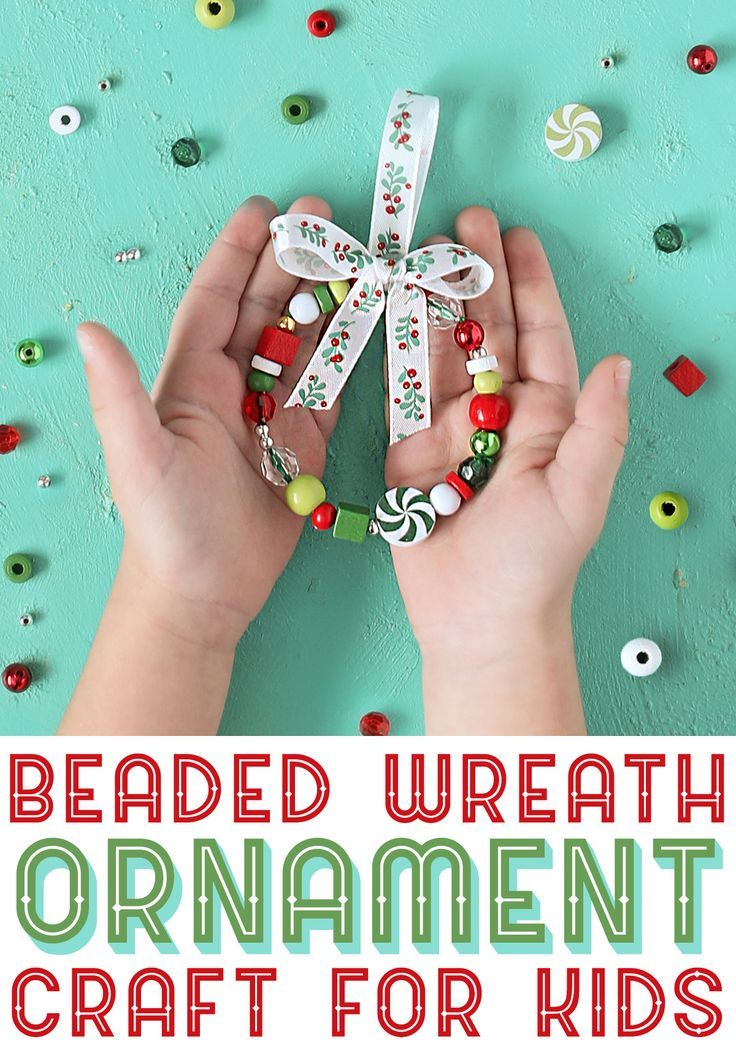 two hands holding beads with the words beaded wreath ornament craft for kids