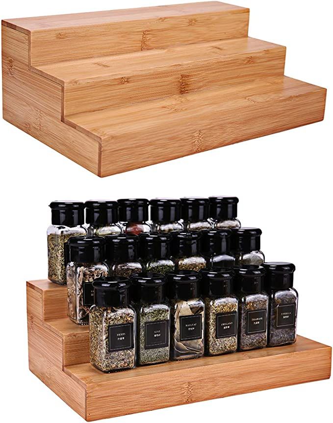 two wooden shelves with spices and seasonings on them