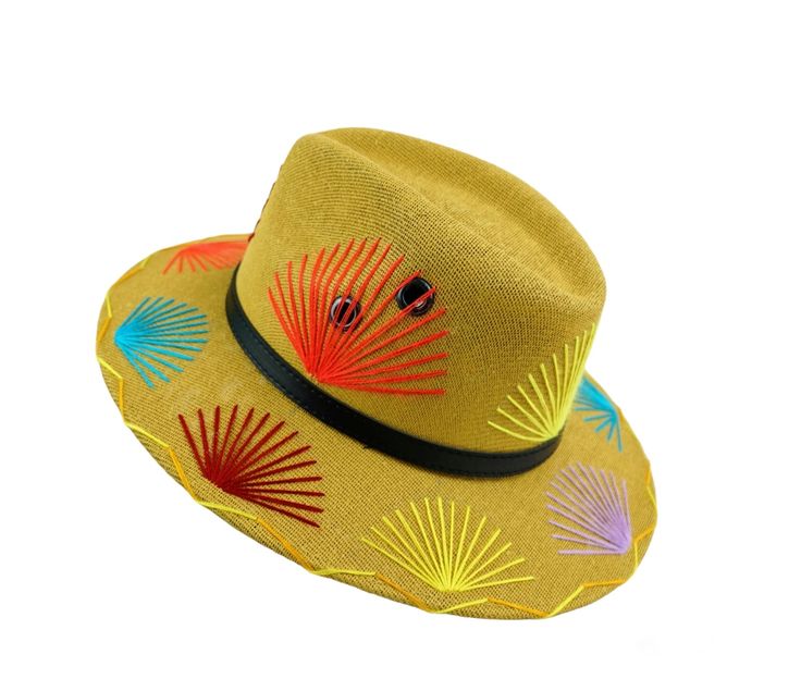 A fashionista's must-have for summer, the Mavis Herrera Summer Artisan Hat is sure to add flair to all your favorite warm-weather activities. Crafted with hand-embroidered detailing in on-trend boho style, this accessory is comfortable and ensures all-day wear with its elastic band. It's available in two sizes - Small/Medium (56-57 cm/22") and Large/XL (58-59 cm/23") - so you can find the perfect fit for you. With the Summer Artisan Hat, you can achieve the perfect look for any beach day or outd Brimmed Fedora For Spring Festival, Bohemian Panama Hat For Spring Festival, Bohemian Short Brim Hat For Summer, Multicolor Summer Fedora With Short Brim, Artisan Summer Hats For Vacation, Bohemian Hat Bands For Spring Festival, Adjustable Panama Hat For Summer Party, Artisan Hat For Spring Vacation, Handmade Bohemian Straw Hat For Spring