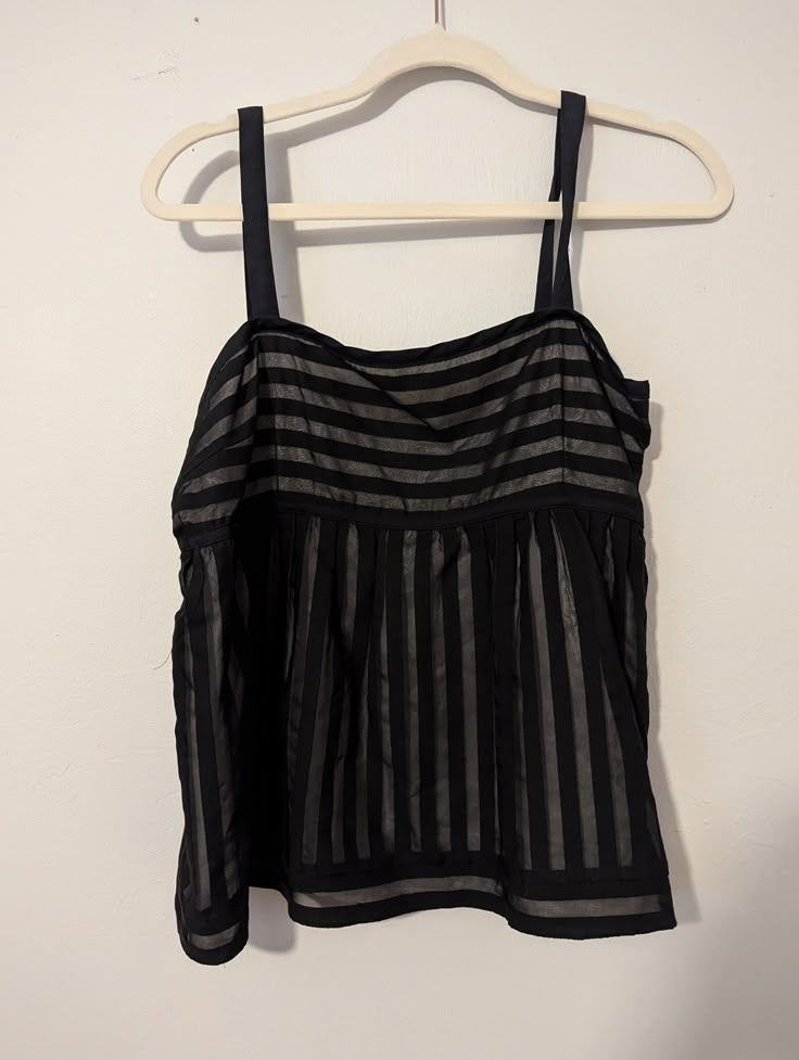 Adorable! Excellent. Used condition black and gray medium blouse  Ax2 Bd2 Black Sleeveless Vest Top, Black Summer Vest Top, Black Vest Top For Summer, Black Vest Tank Blouse, Black Tank Vest Blouse, Black Tank Blouse With Vest Detail, Casual Black Sleeveless Blouse, Casual Black Blouse With Vest Detail, Casual Black Blouse With Vest