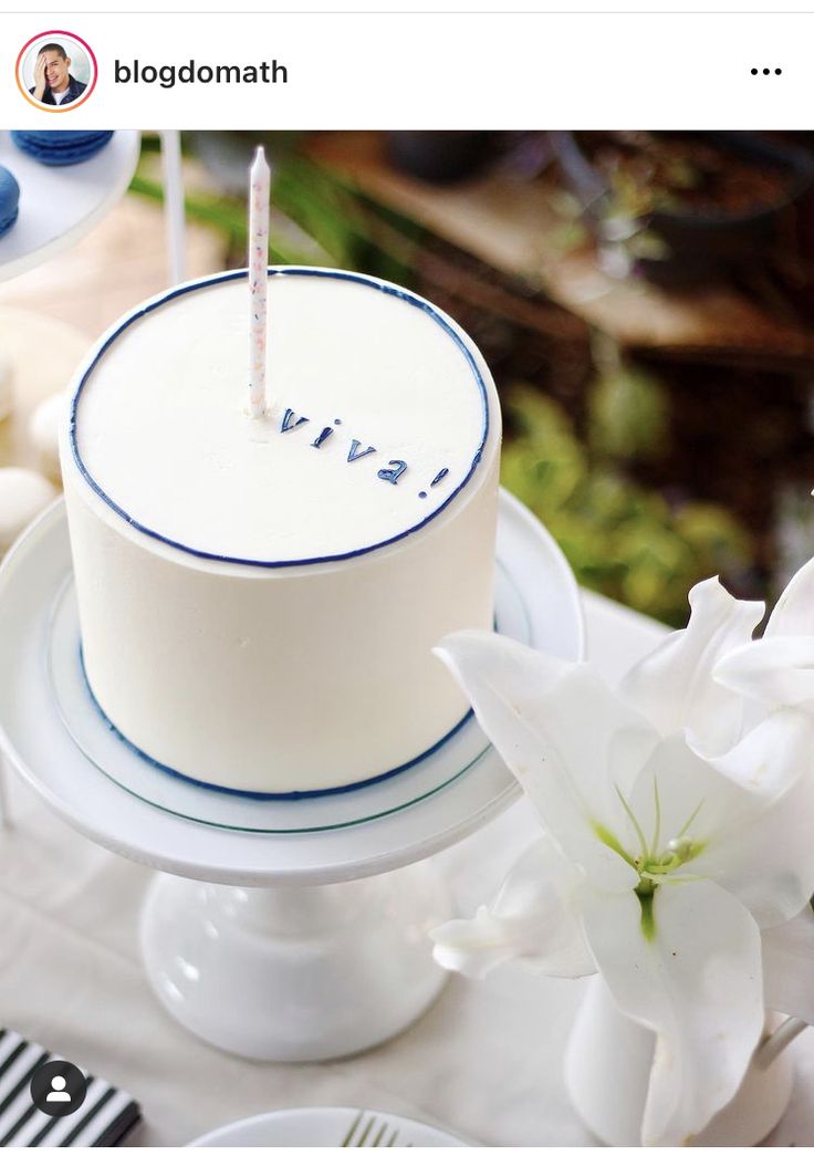 a small white cake sitting on top of a table