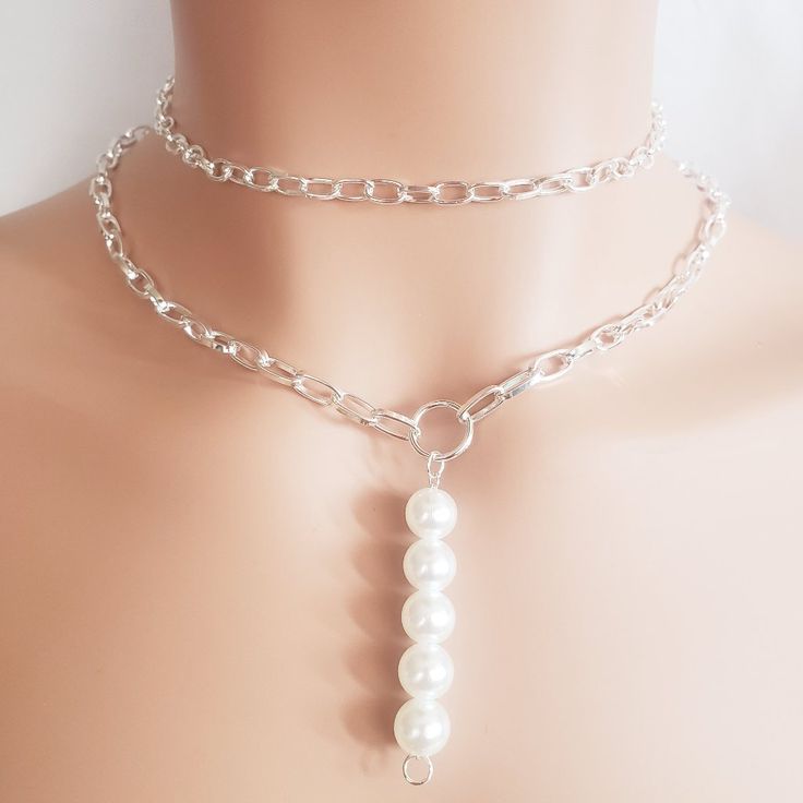 Paris Pearl Silver Necklace Condition: New Material: Silver Plated Length: 17in With 3in Extender White Pearl Lariat Necklace With Clavicle Chain, White Metal Pearl Choker Necklace, White Pearl Choker Chain Necklace, White Minimalist Layered Necklace With Adjustable Chain, White Lariat Pearl Chain Necklace, White Lariat Chain Jewelry, White Adjustable Lariat Chain Necklace, Adjustable White Lariat Chain Necklace, White Clavicle Chain Necklace Choker