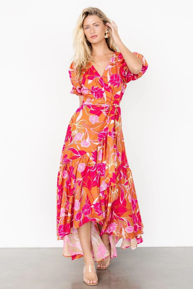 Make a statement in the colorful Lori Maxi Dress, featuring a vivid orange and pink floral print. This dress includes fun features like a high-low tulip skirt, ruffle detail, and short puff sleeves. Skirt Ruffle, Waist Sash, Tulip Skirt, Zipper Shorts, Surplice Neckline, Dress Orange, Pink Floral Print, Orange And Pink, Cup Size