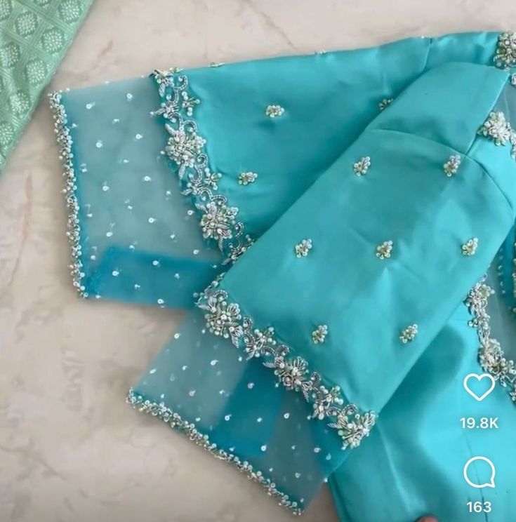 Aari Work Ideas, Silver Work Blouse Designs, Blue Blouse Maggam Work, Silver Maggam Work Blouse Designs, Maggam Work Net Blouse Designs, Silver Zari Work Blouse, Cut Work Maggam Designs, Blouse Designs Net, Simple Maggam Work Designs