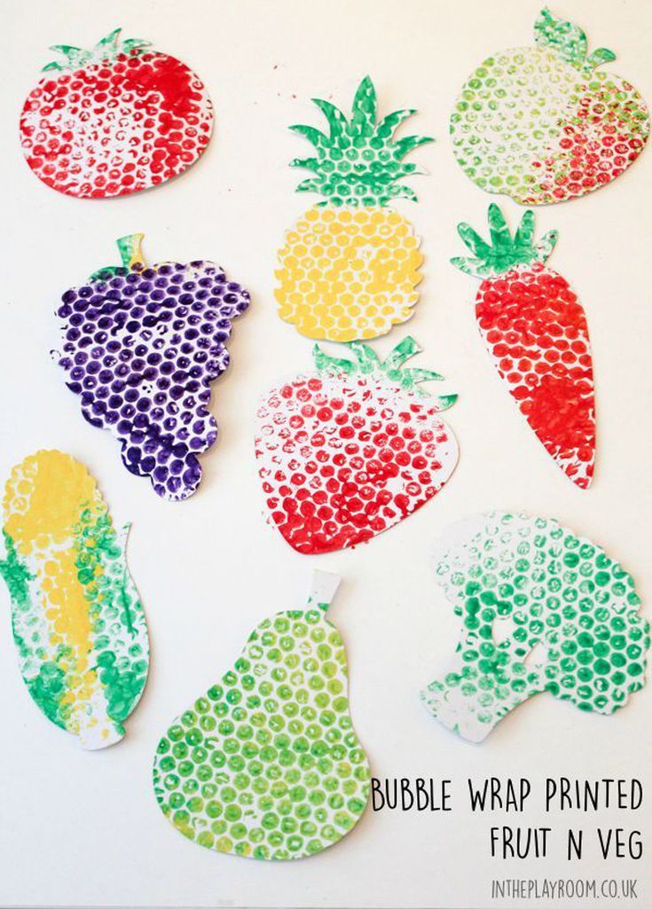 the paper cut outs are made to look like fruit