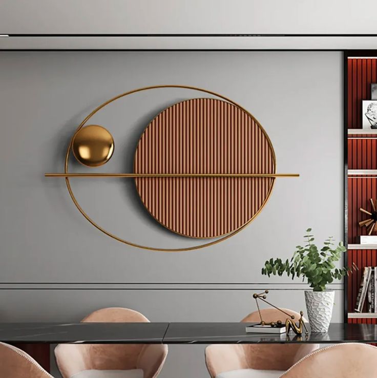 a dining room table with chairs and a wall mounted art piece on the wall behind it