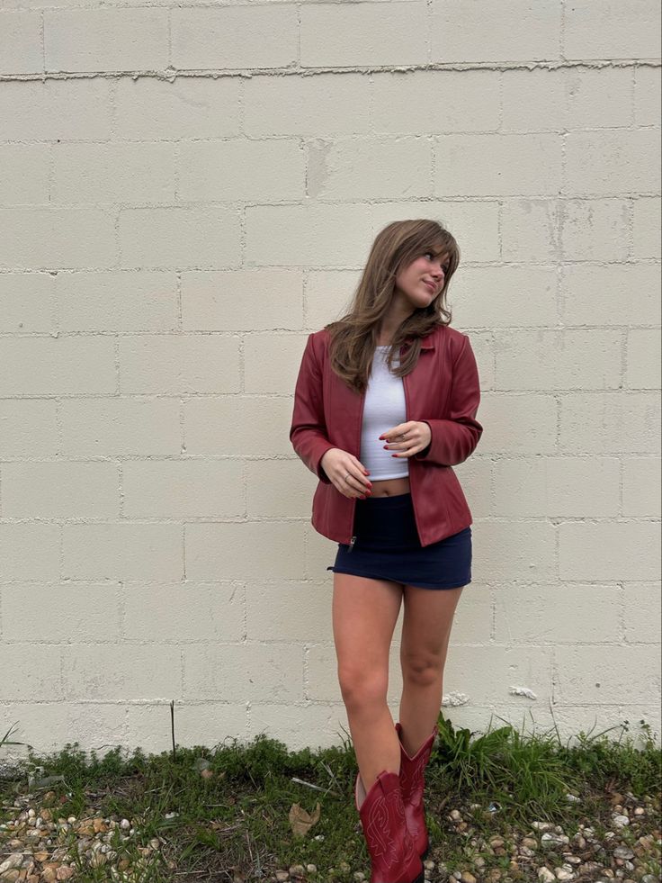 Western Outfits Women Red Boots, Cowboy Jacket Aesthetic, Red Leather Cowboy Boots, How To Wear Red Cowboy Boots, Vintage Red Leather Jacket Outfit, Leather Jacket Cowboy Boots Outfit, Short Red Cowboy Boots Outfit, Style Red Cowboy Boots, Poses With Cowboy Boots