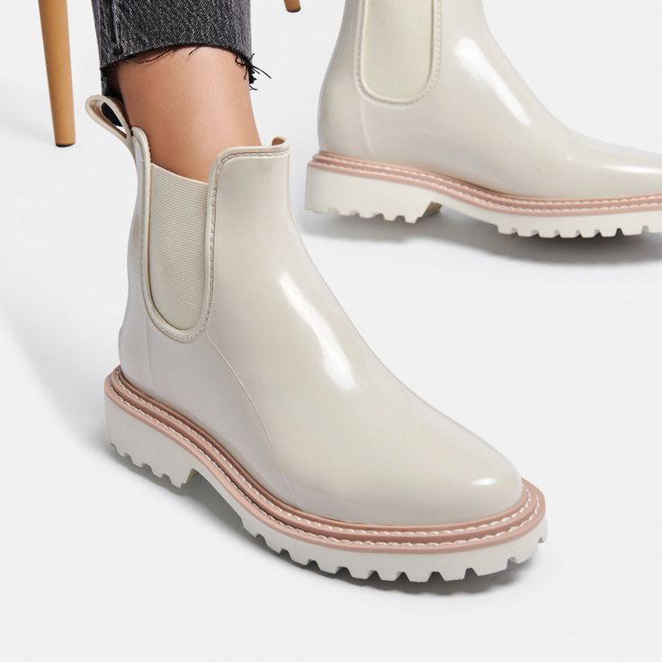 STORMY RAINBOOTS IVORY PATENT STELLA – Dolce Vita Dolce Vita Heels, Taupe Boots, Lug Boots, Chelsea Rain Boots, Patent Boots, Trending Sandals, Winter Ankle Boots, Black Boots Tall, Dolce Vita Shoes