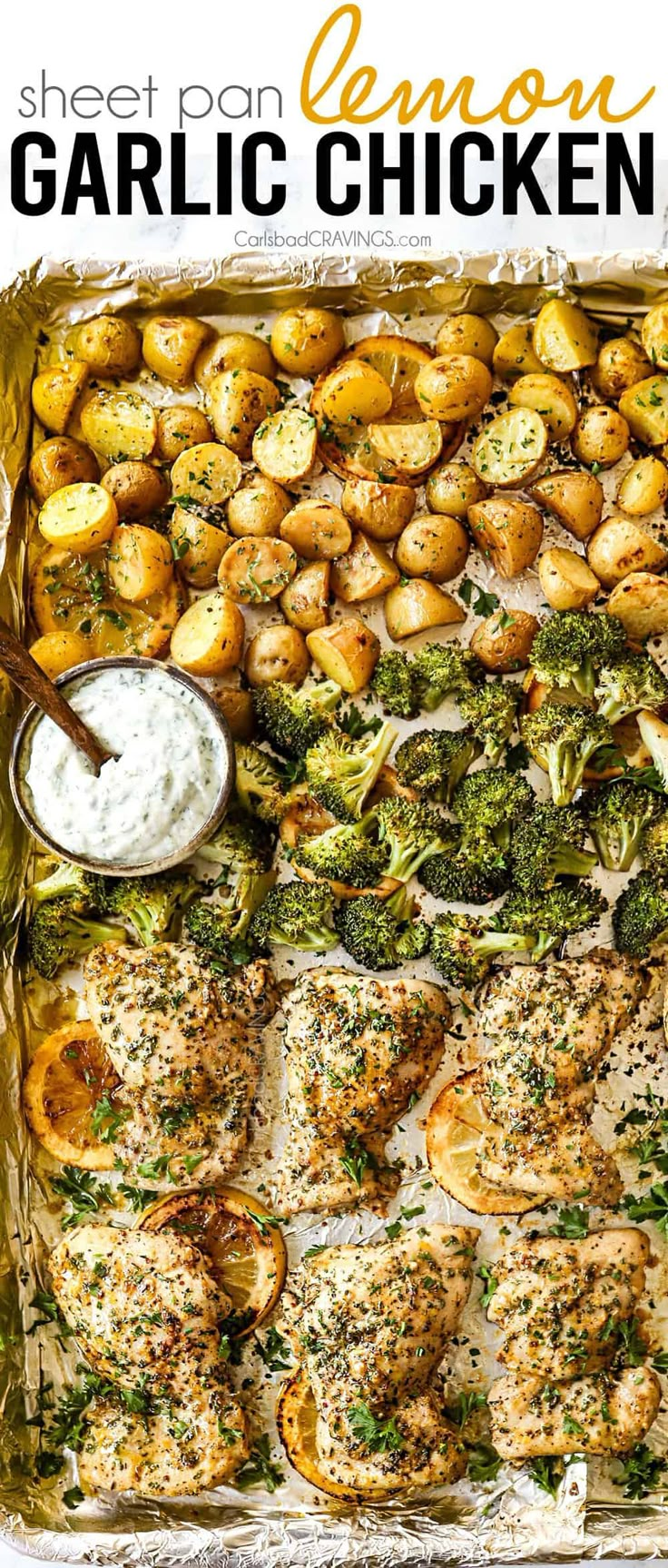 sheet pan lemon garlic chicken with potatoes and broccoli on the side is shown