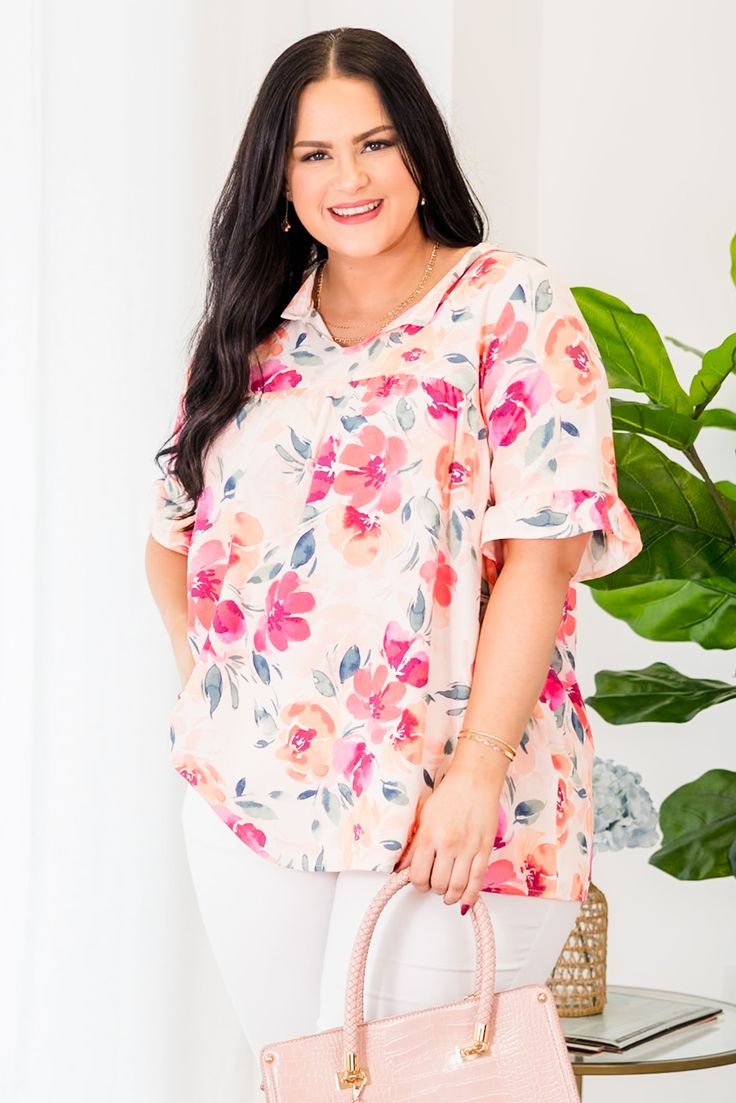 Chic Soul plus size clothing, peach-coral floral print top with short sleeves Peach Feminine Blouse For Day Out, Feminine Peach Blouse For Day Out, Spring Peach Blouse For Day Out, Peach Blouse For Beach, Spring Season, Peach V-neck Blouse For Spring, Peach Blouse For Beach In Spring, Peach Blouse For Spring Beach Occasions, Peach Floral Print Summer Blouse, Casual Pink Floral Print Blouse