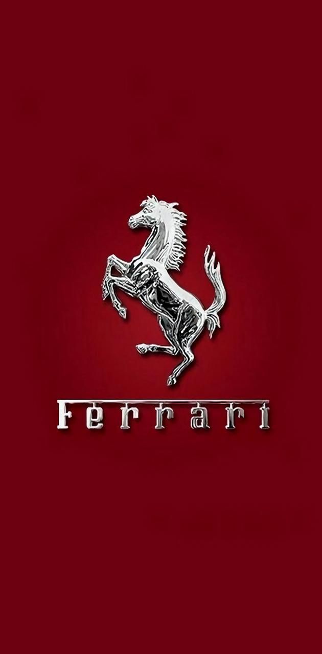 ferrari logo on a red background with the word ferrari written in silver and black letters