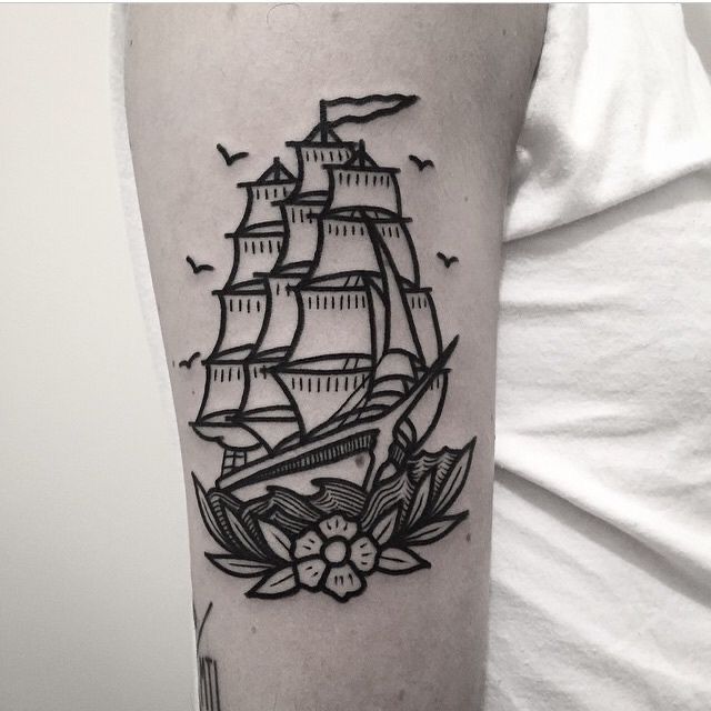 a black and white photo of a ship on the arm