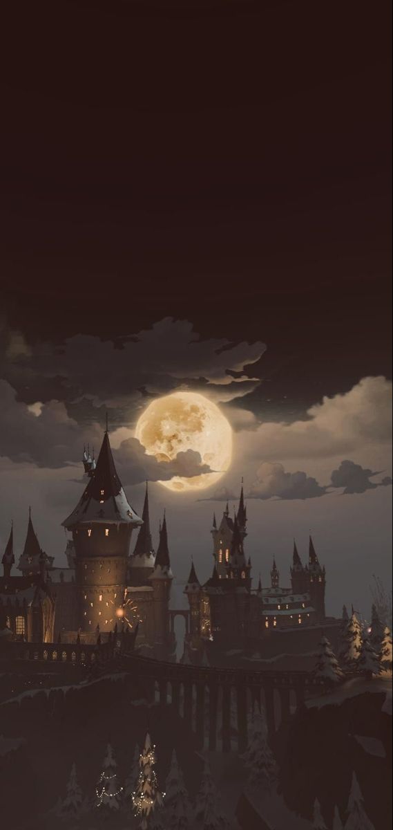 a castle with a full moon in the background