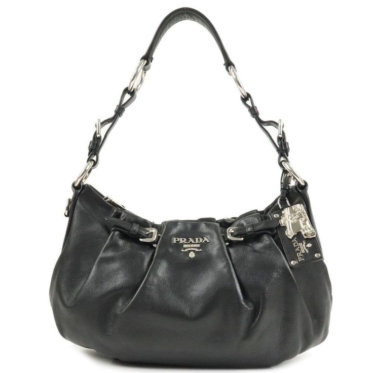 Prada Leather Shoulder Bag Black Size: W34 H22 D8cm Shoulder Strap Length46-54cm Color: Black Prada Leather Shoulder Bag, Dream Bags, Prada Nylon, Prada Leather, Pretty Bags, Black Purses, Wallet Accessories, Diaper Backpack, Casual Backpack