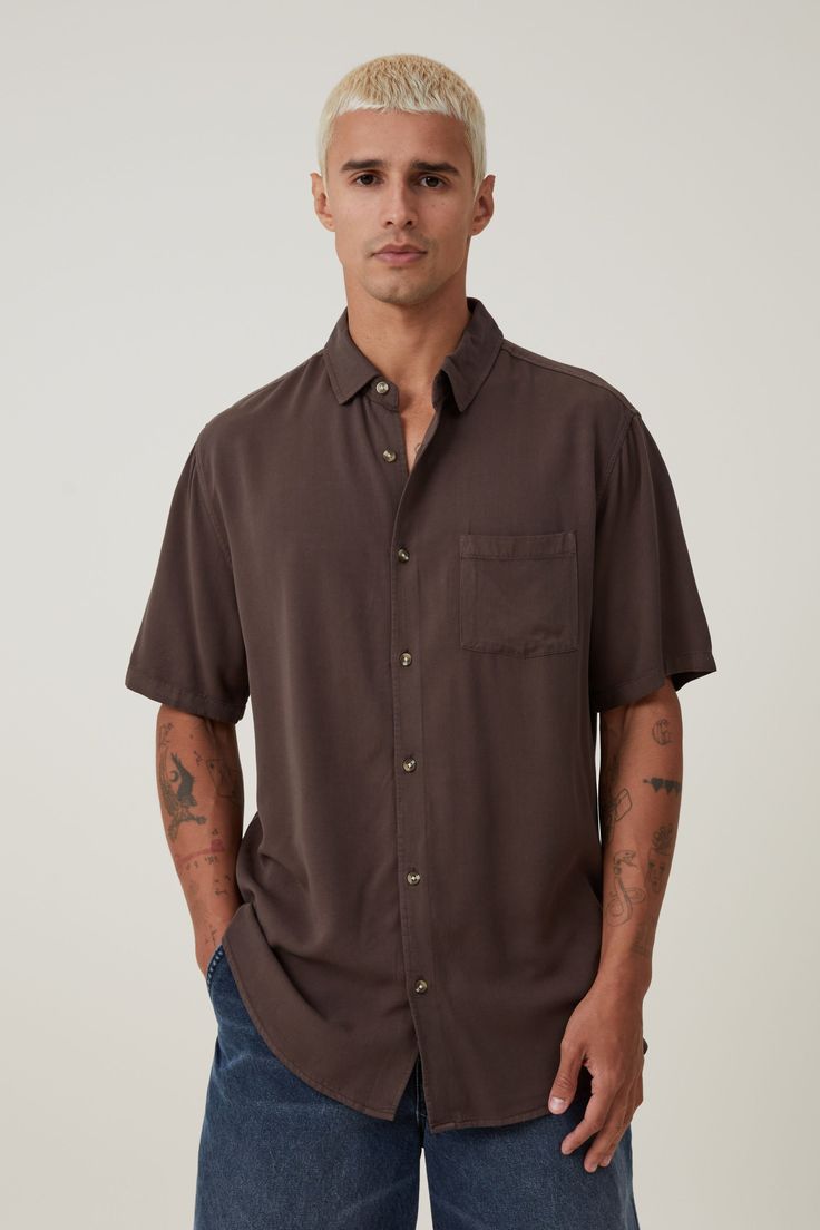 The cuban short sleeve shirt is a staple for your shirts collection. Features a loose fit, button front, chest pocket and short sleeves.

Features:  
- front chest pocket - loose Fit - Classic button up shirt style - Short sleeves - collar Brown Short Sleeve Shirt With Button Closure For Summer, Brown Button-up Camp Shirt For Summer, Brown Summer Camp Shirt With Button Closure, Brown Collared Camp Shirt For Summer, Summer Brown Button-up Camp Shirt, Brown Summer Camp Shirt, Brown Relaxed Fit Camp Shirt With Short Sleeves, Brown Relaxed Fit Short Sleeve Camp Shirt, Brown Short Sleeve Collared Shirt For Summer